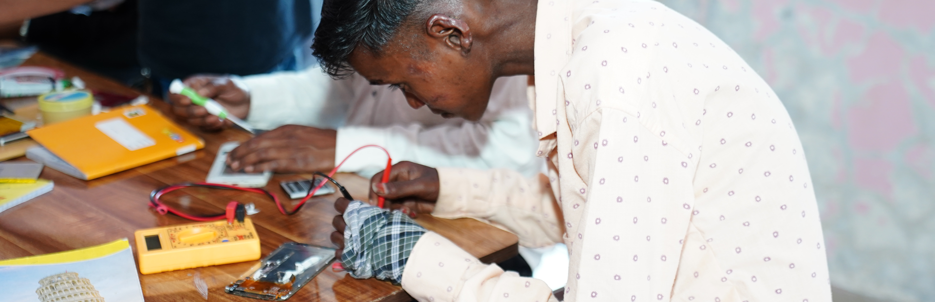 A man doing soldering work